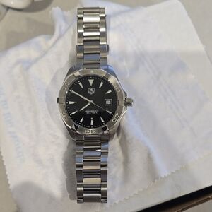 Tag Heuer Silver and Black Watch with Stainless Steel Design
